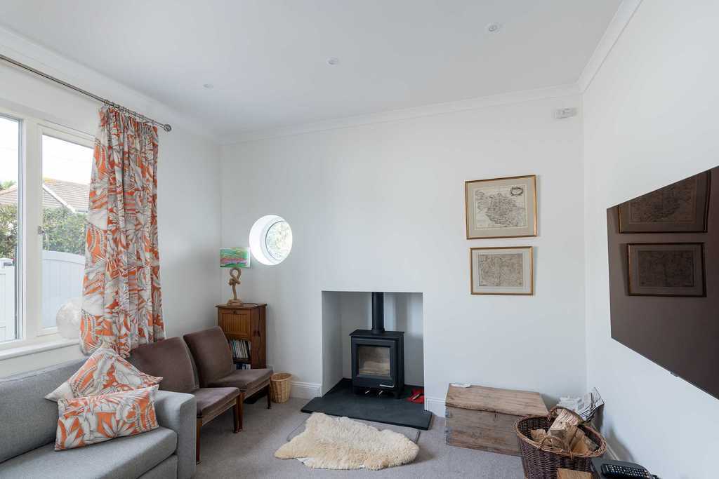 Snug, with woodburning stove and large TV 