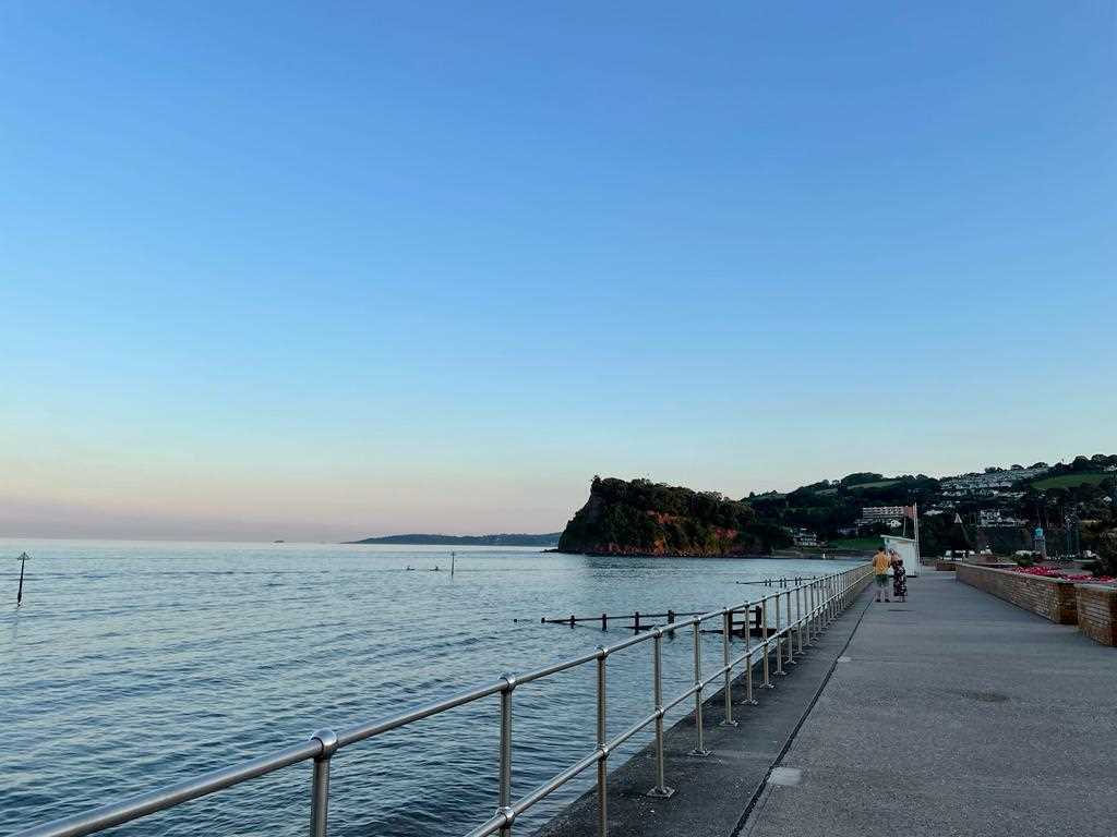 High tide at Teignmouth, looking towards the Ness headland 