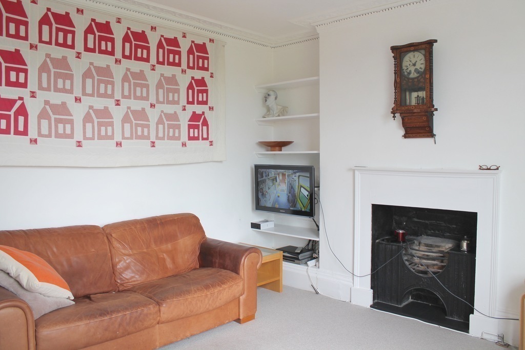 Our living room, with our homemade quilt!