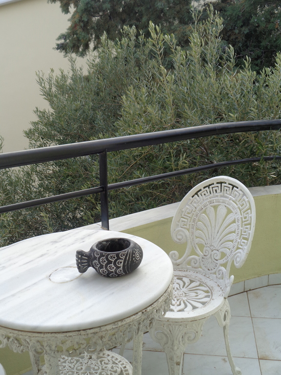 upper floor bedroom balcony and olive trees