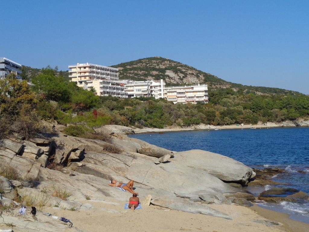 THE TINY BEACH-ROCKS AND A TOURIST  COMPLEX IF YOU SWEEM TILL THERE