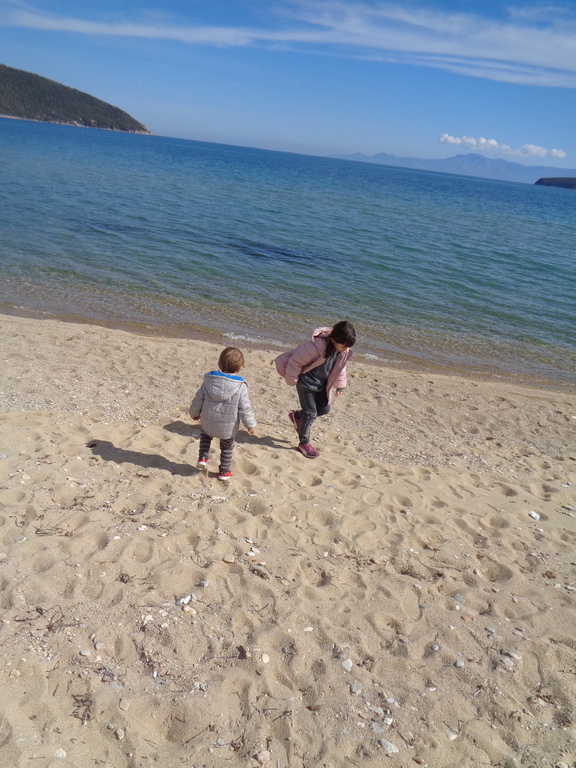 siblings at the N.PERAMOS village beach...8km driving..or  walking ..or joking from our  home