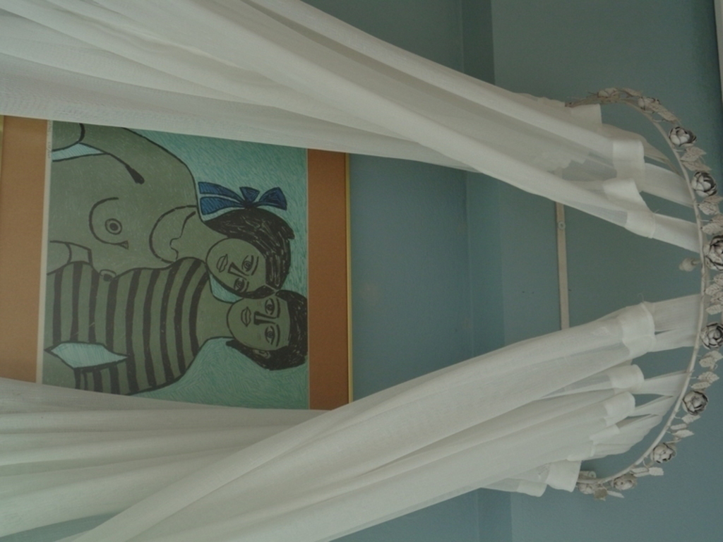 at one of upstair's bedrooms   bedroom curtains and art