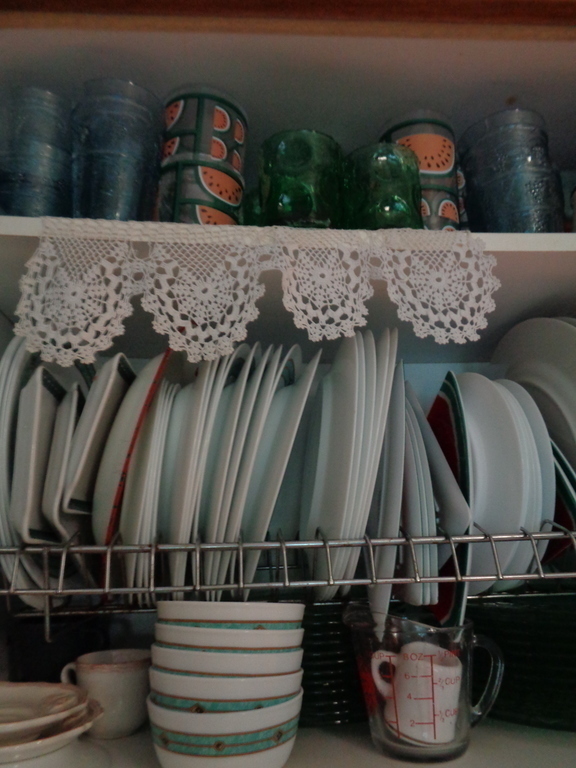 kitchen selves with everyday  service plates