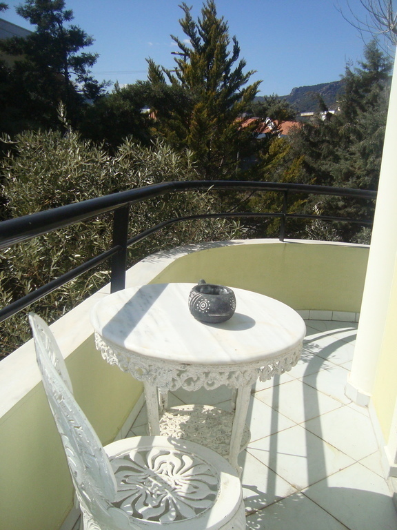 the balcony and trees all around it-creating microclima for summertime