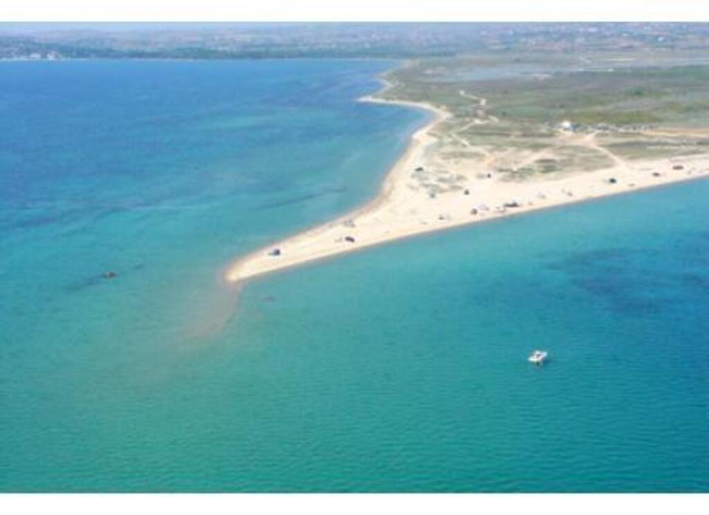 Fanari beach(the best) from "potamos" .Be careful, because there are sea currents near the "nose".