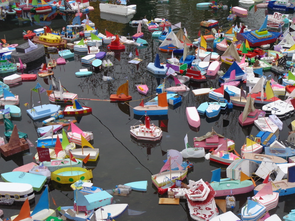 drama town's springs  devoted to santa barbara.  The boats miniatures made by thelocal youth are floating  only on st. Barbar...