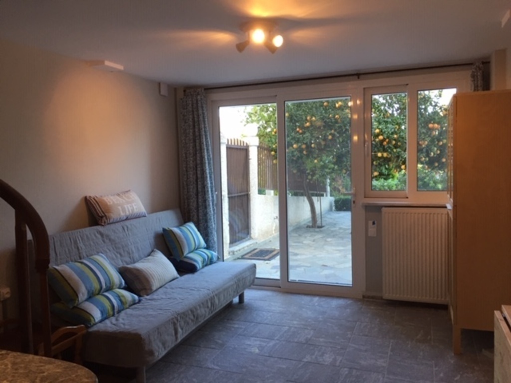 Guest house sitting area next to kitchen