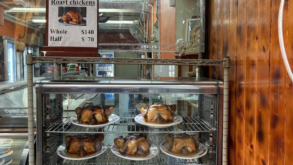 Lamma Deli with cheeses, roasted chicken and assorted meats