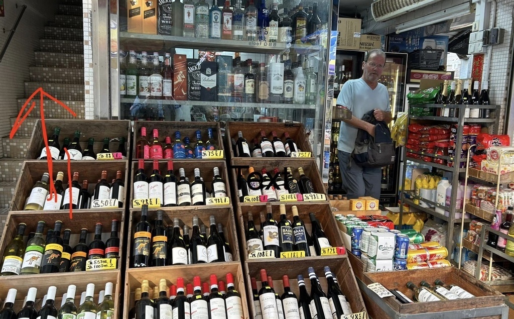 This small wine and sundries shop on the Main Street is one of many and located right next to our flat.