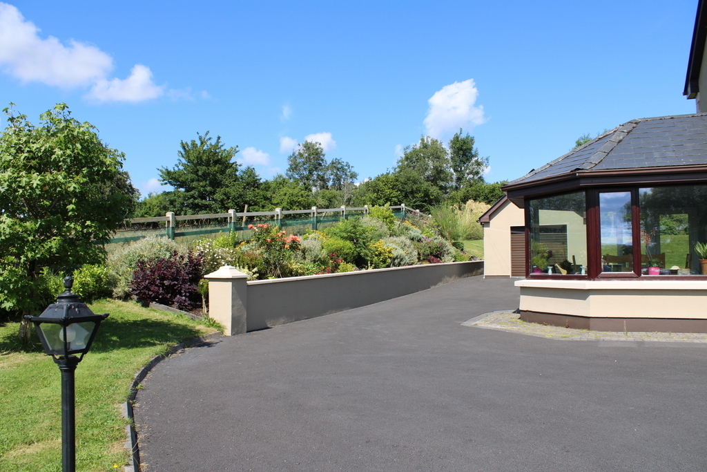 Sunroom Exterior, Side Flower Bank 