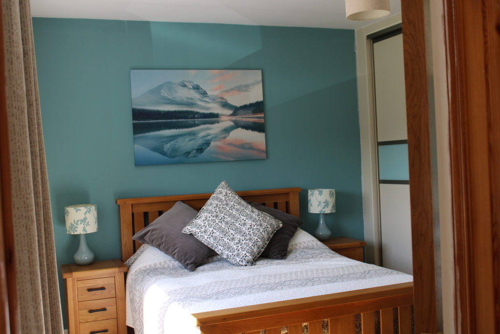 Bedroom 3 Queen Size Bed to the front of the house 