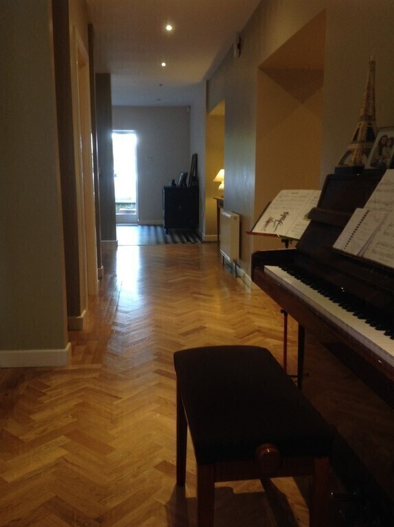 Piano in hallway