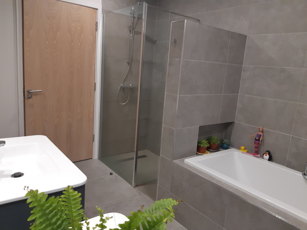 Bathroom with bath & shower