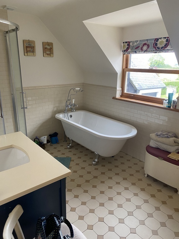 main bathroom with shower and bath