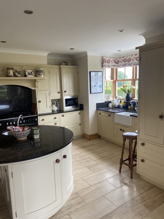 kitchen with dishwasher, coffee machine, microwave etc etc