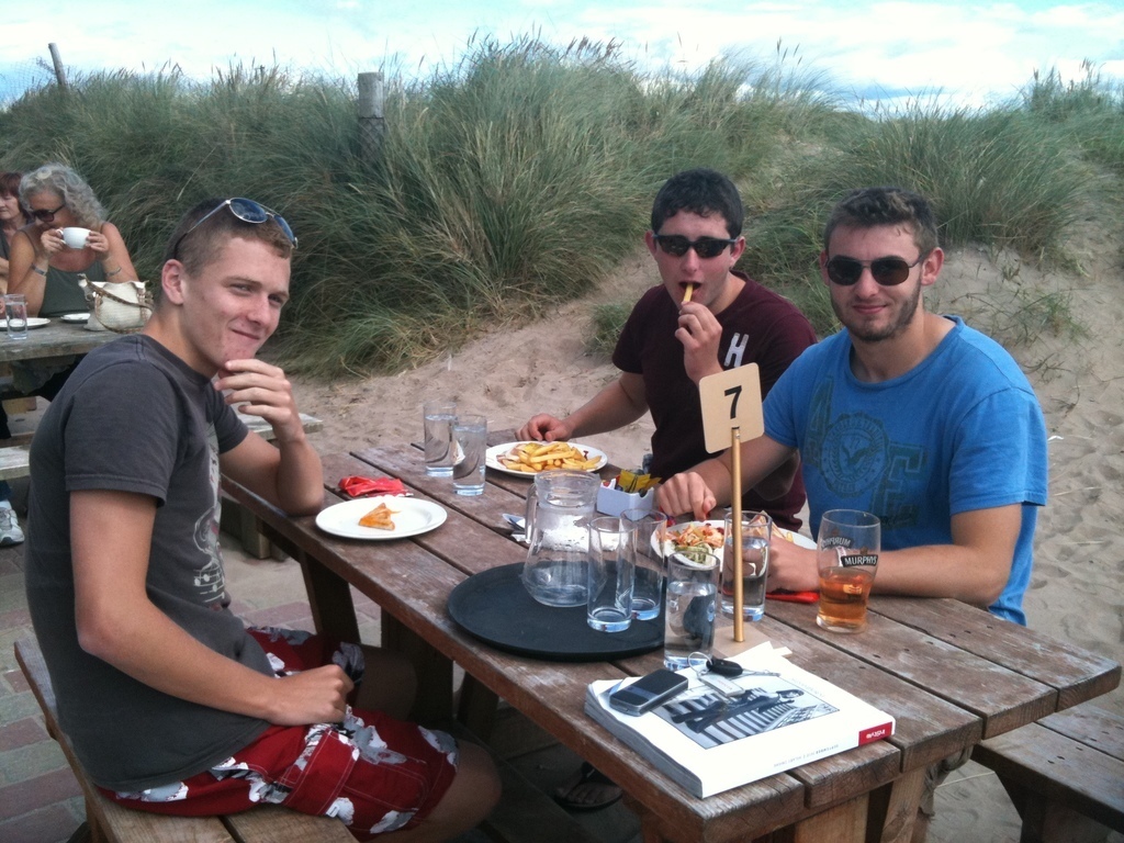 Our son Jack, on right of photo, dining at Sammy's restaurant, Inch beach,near the cottage.