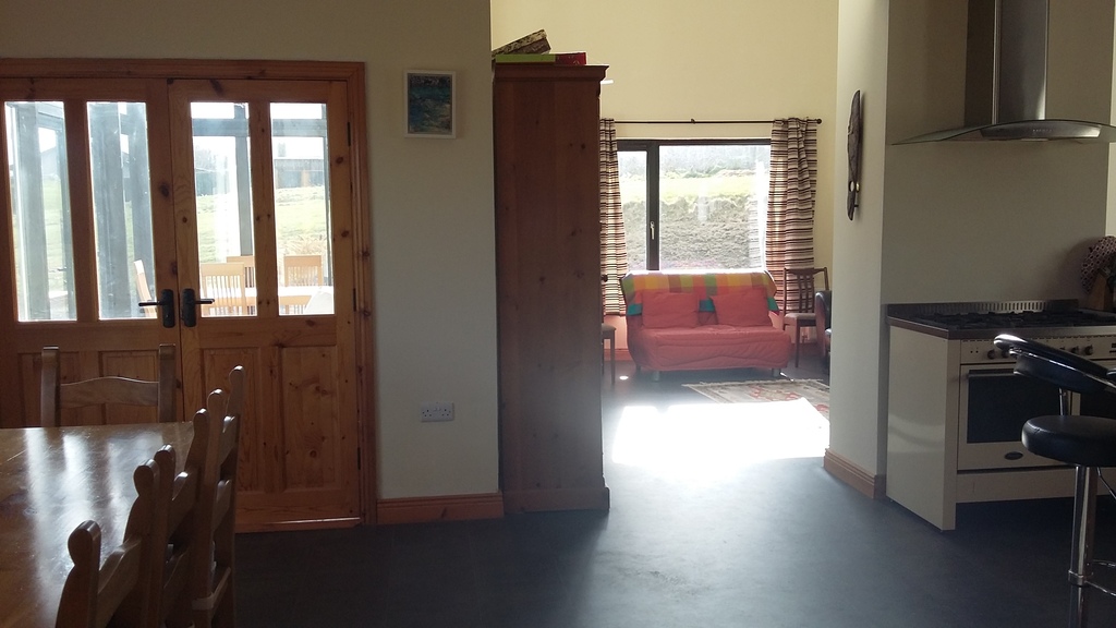 Dining area looking through to living area from kitchen