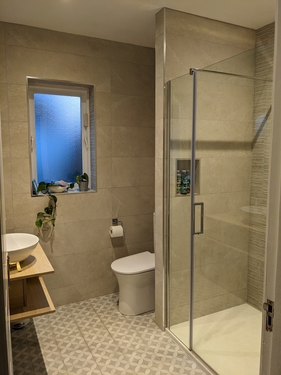 Downstairs bathroom with large shower