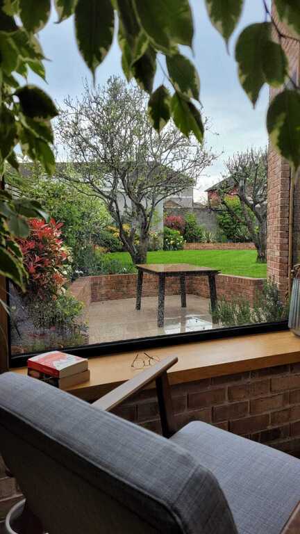A lovely spot to sit and read on a rainy day!