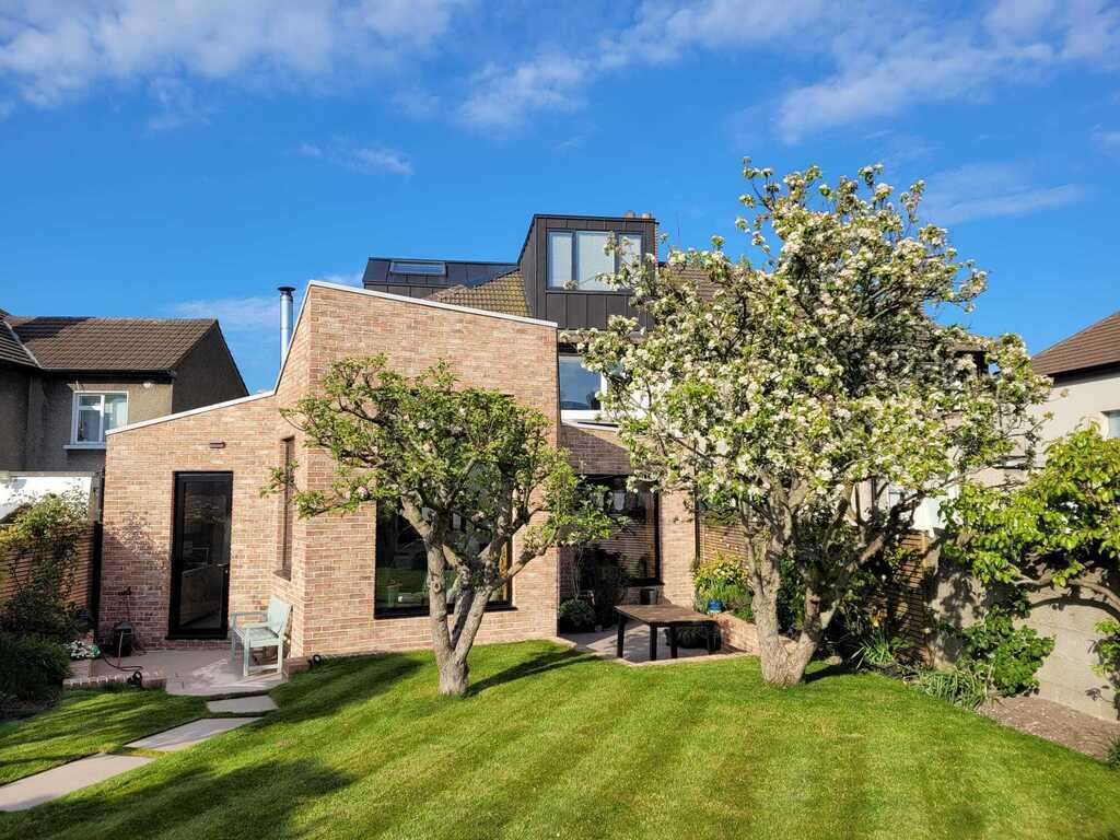 Spring in our garden with the apple trees in bloom.