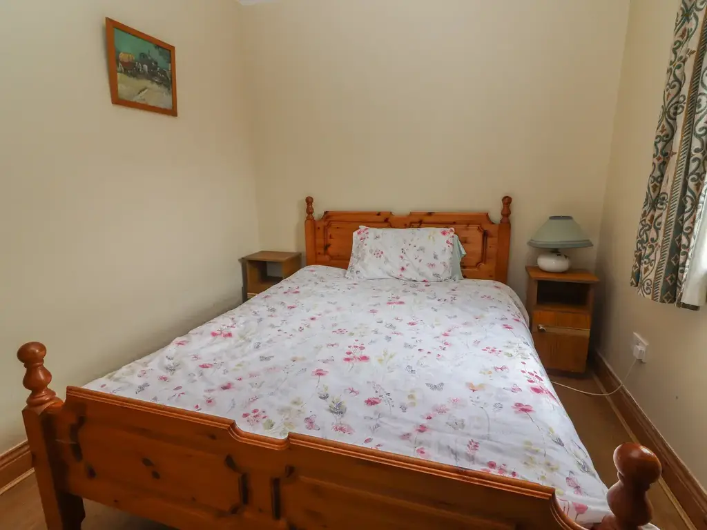 Bedroom #4: Double Bed (located downstairs)