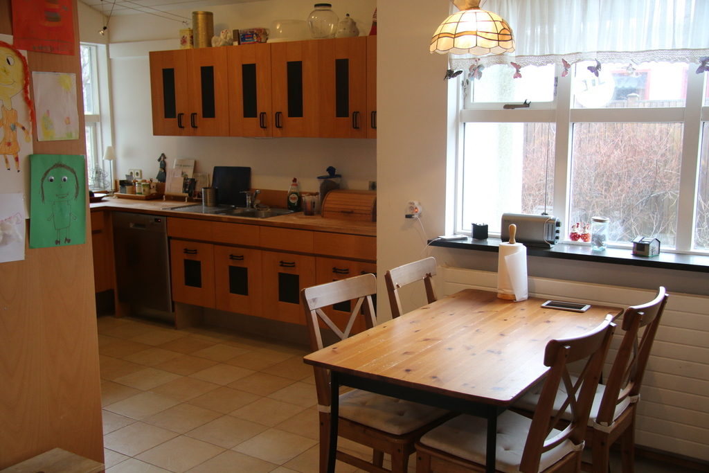 The kitchen which is big and has all appliances.