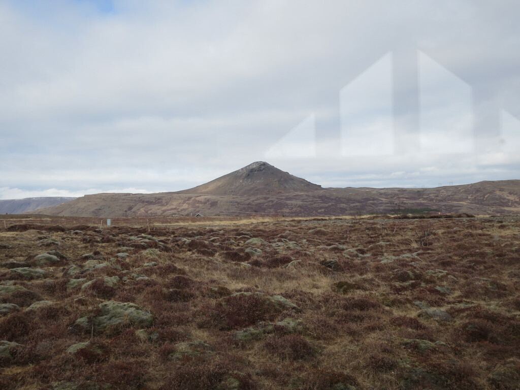 The view from the kitchen window of our cottage, it shows mountain Sandfell to the north.