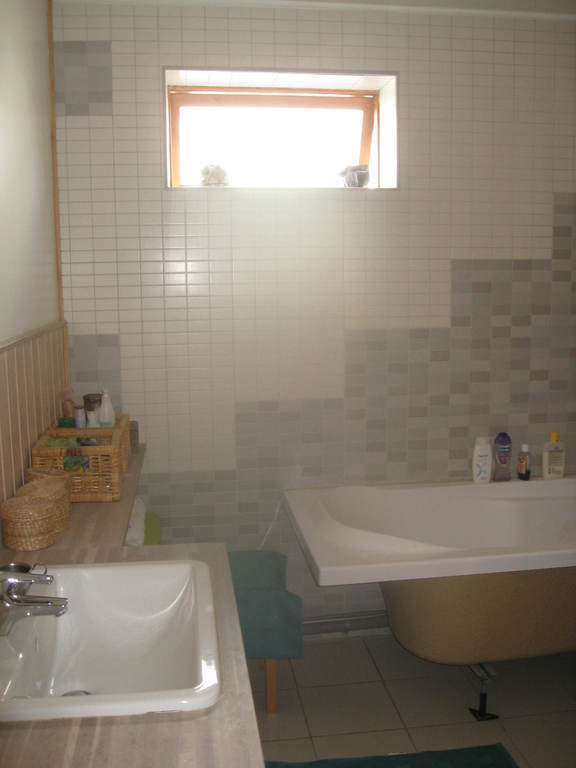 Bathroom with tub and shower