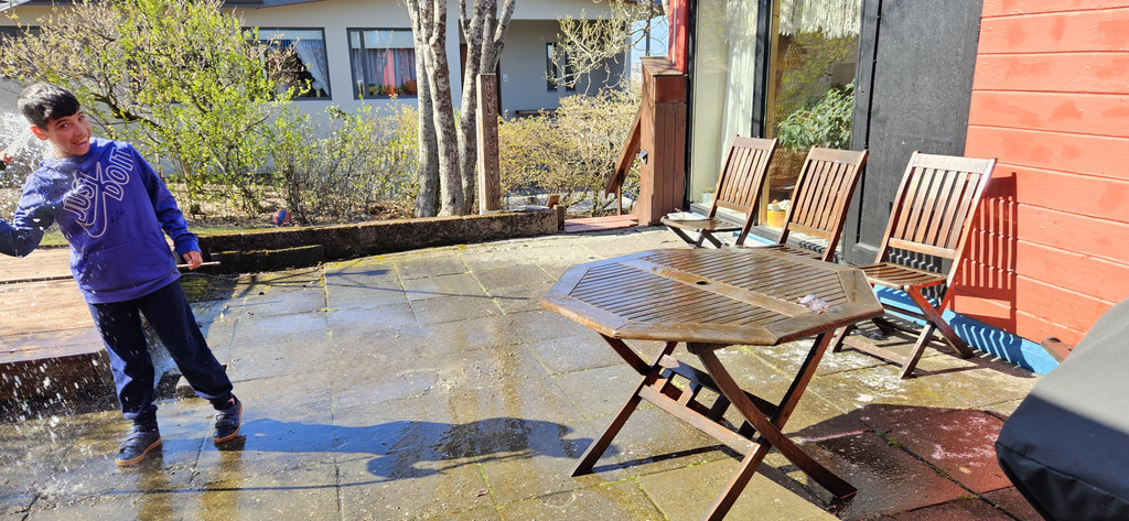At the entrance to our home, there is a sunny spot with table and chairs.