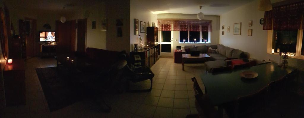 Cozy time, panoramic photo of the TV area and the living room