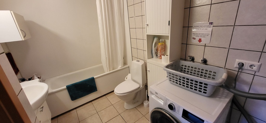 The bathroom in the other apartment.