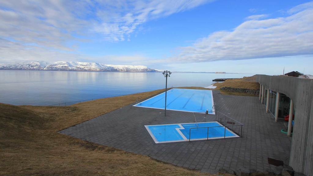 The swimming pool in Hofsós in northern Iceland.  A magnificent view of the nature from the pool.  About 3 hours from Búðardalur