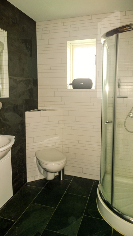 The bathroom is small but clean and has everything you need.