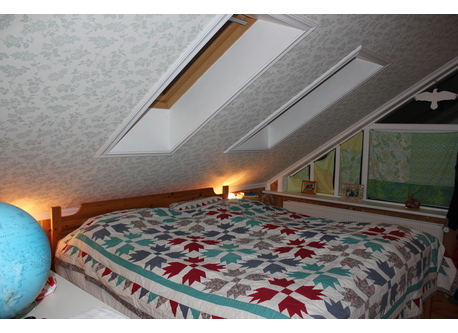 The top floor bedroom. The bed is 180*200 cm. 