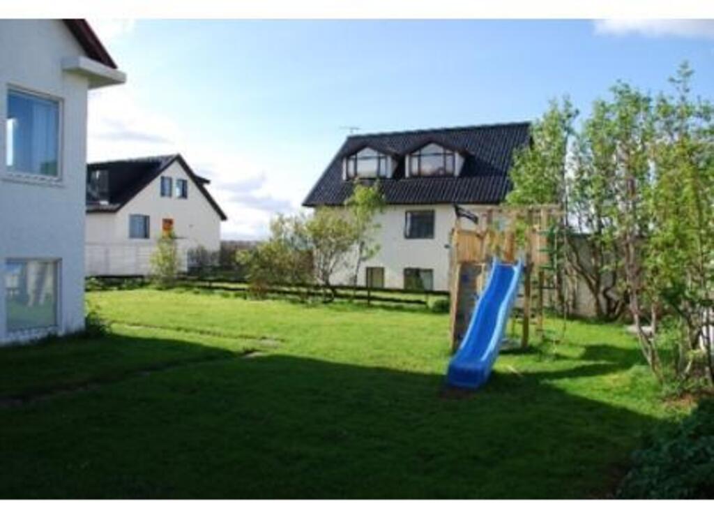 Garden, with a kid's castle and slide