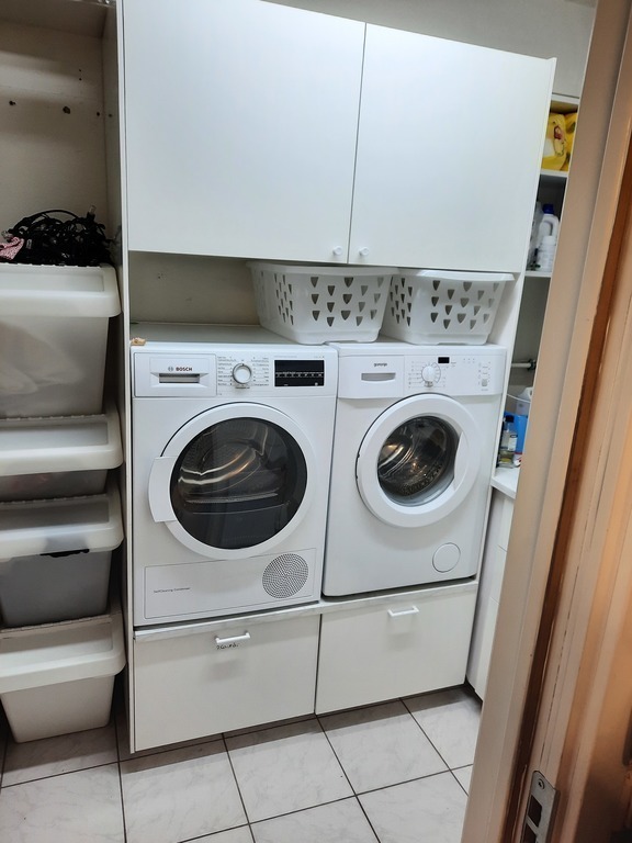 Laundry room with washer and dryer