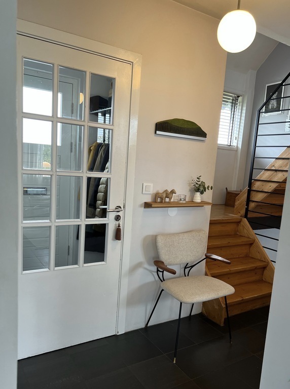 From the corridor there is a staircase leading to the first floor and the basement