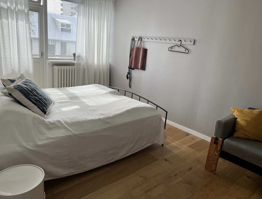 From the bedroom you can walk out to a small balcony from where you have a view to the south-east over the 'Blue mountains' 