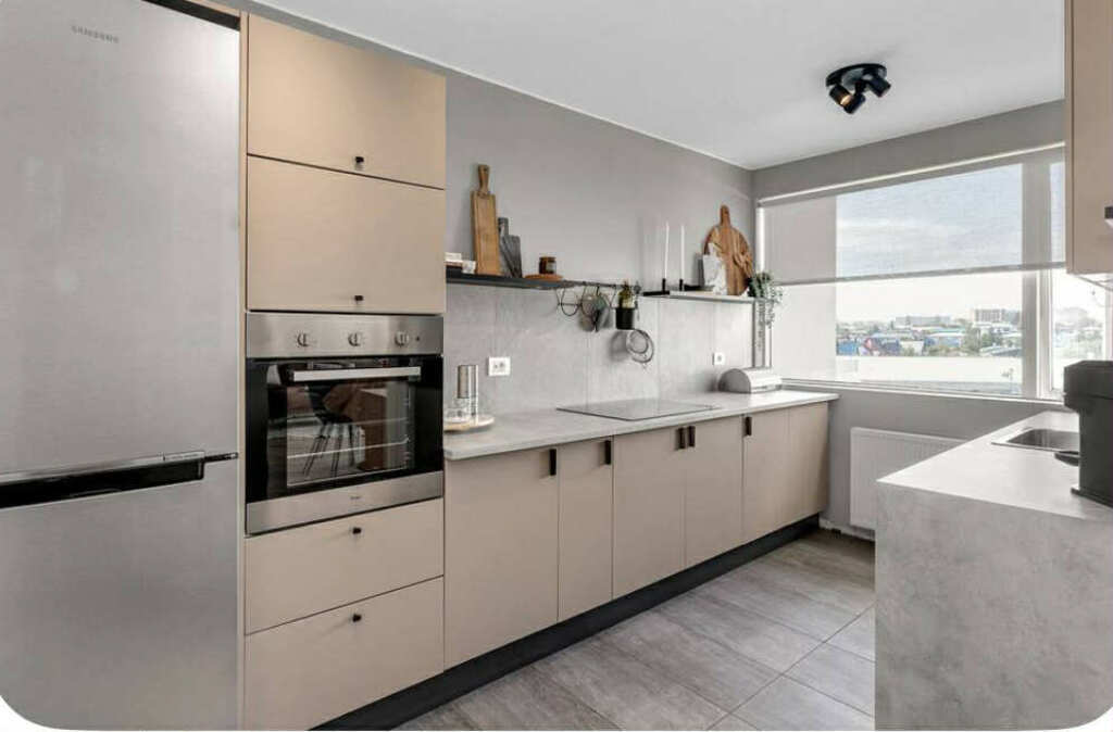 Kitchen with dishwasher, oven, microwave etc. 