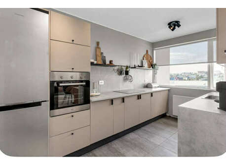 Kitchen with dishwasher, oven, microwave etc.