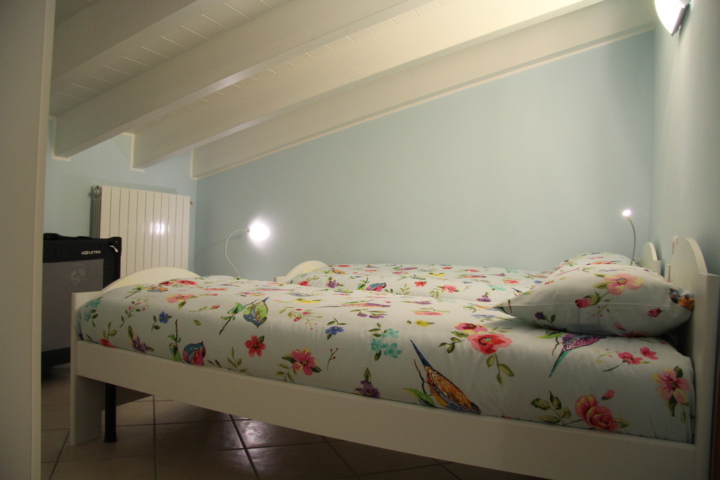 bedroom second floor, 2 beds with bedsite tables, wardrobe