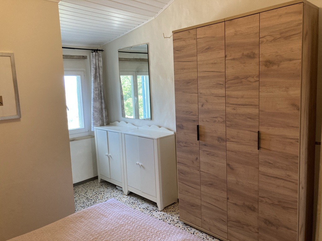 From the bedroom you get the small bathroom