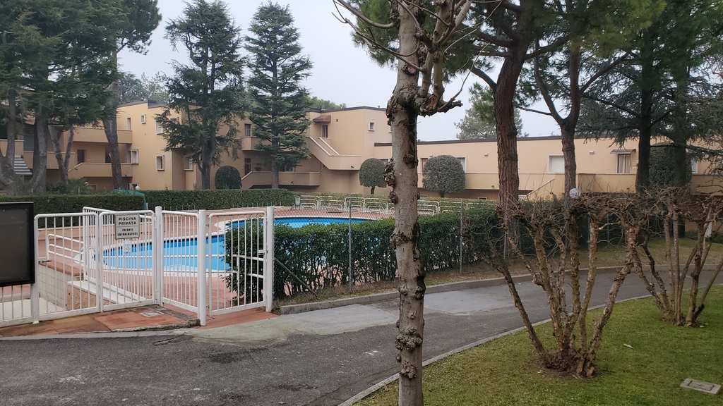 secure entrance to pool with  lifeguard during opening hours
