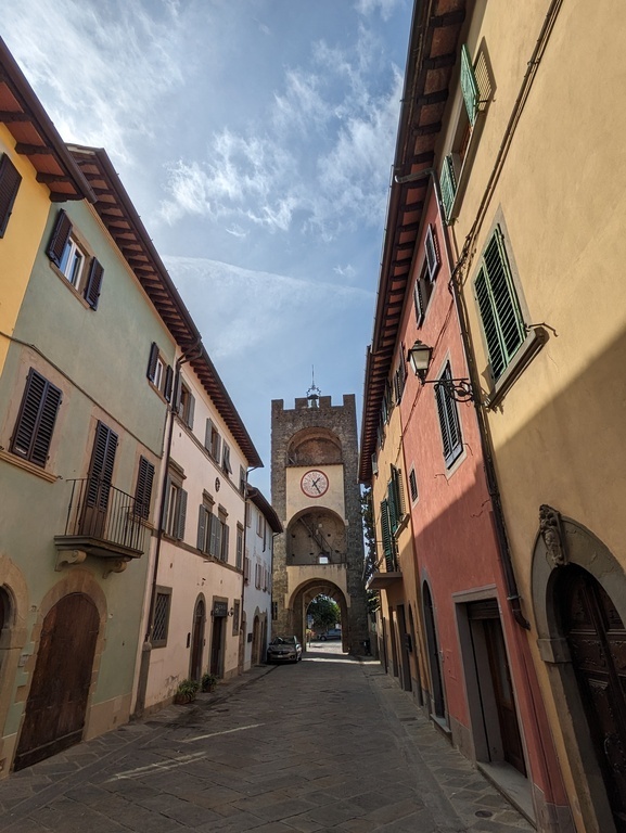 The main road in Castelfranco di Sopra, with the Arnolfo's Tower