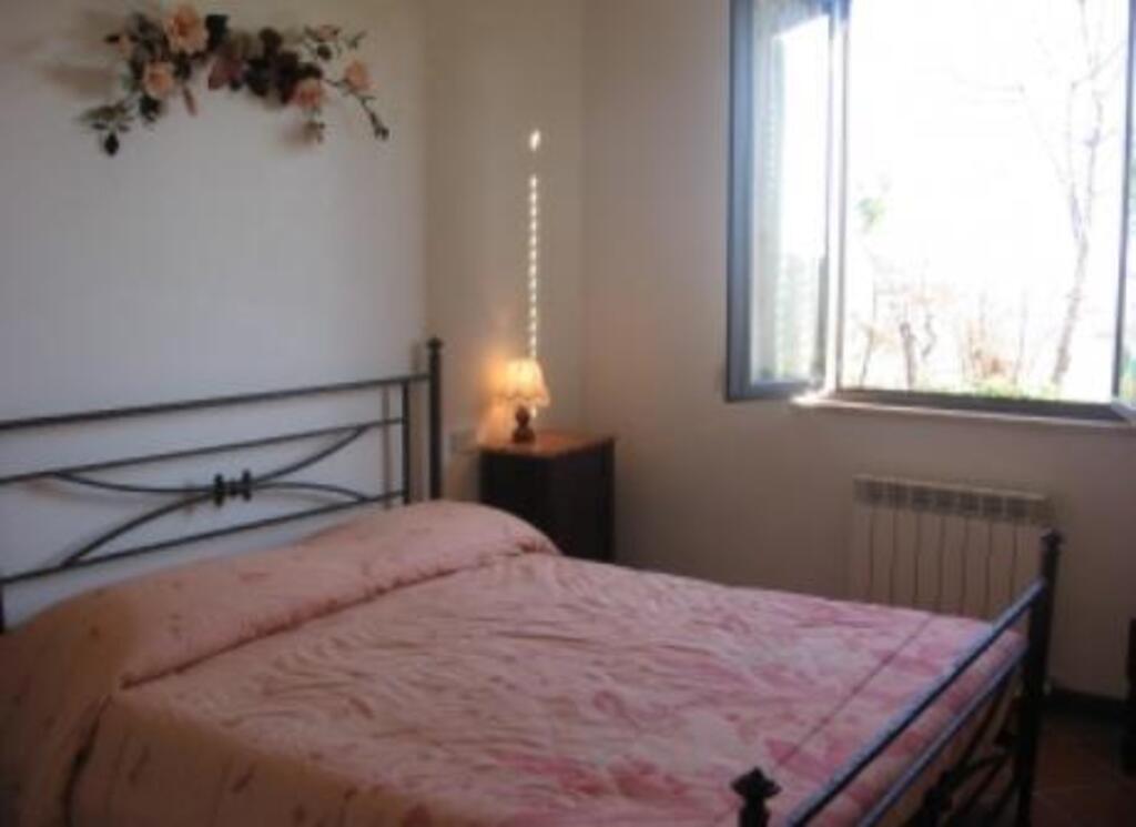 Camera Rosa - Pink bedroom