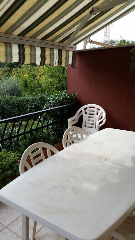 on the veranda with the curtain