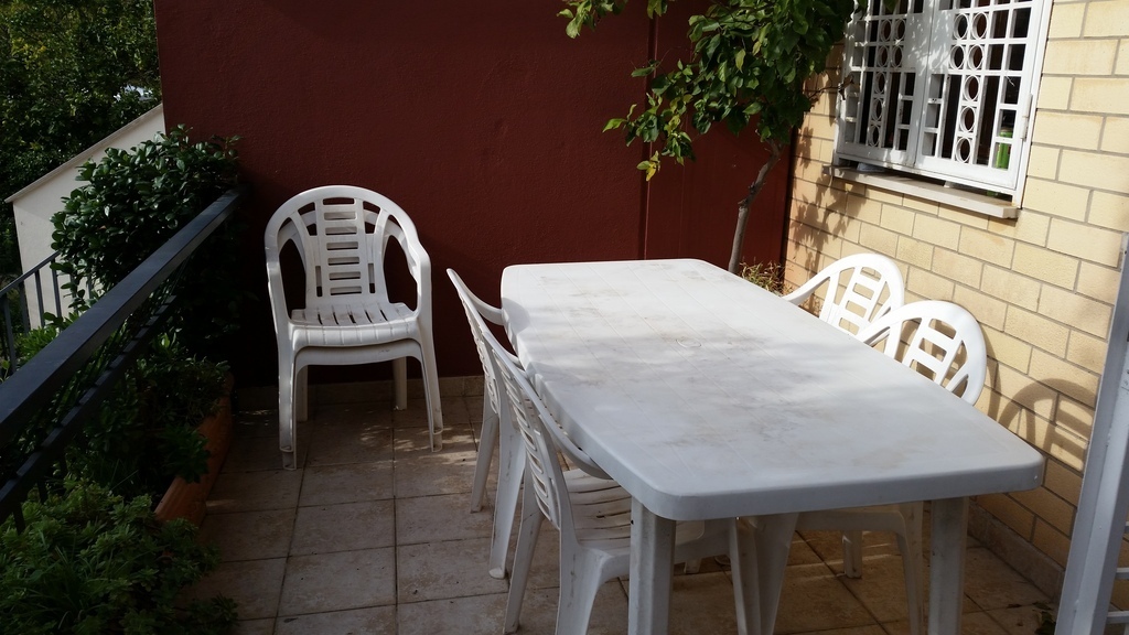 the large table on the veranda