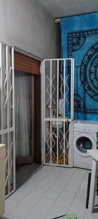 veranda con lavatrice