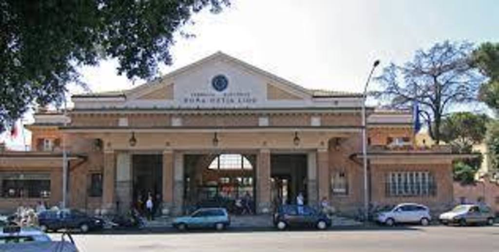 The local railway (5 minutes walking from home) in 30 minutes will leave you here (Stazione Porta San Paolo)